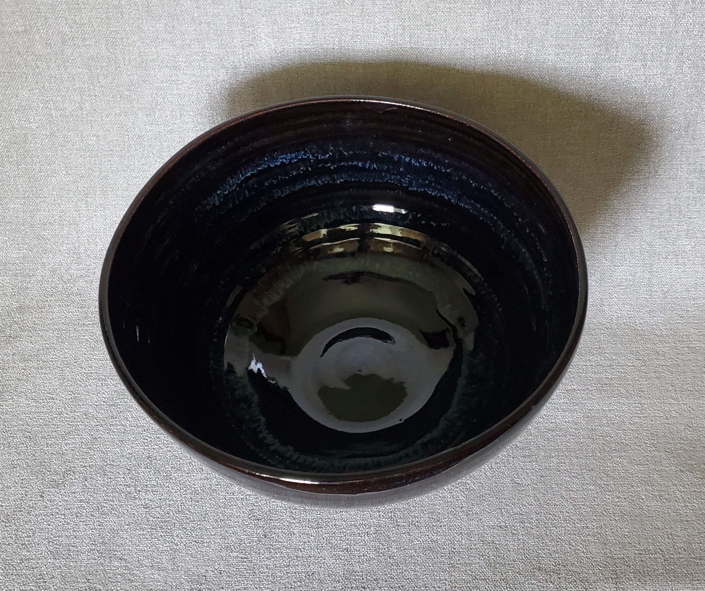 Large blue black bowl
