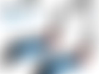 A collection of tools for assembling a wheel and a wheel stand, displayed on a workbench.