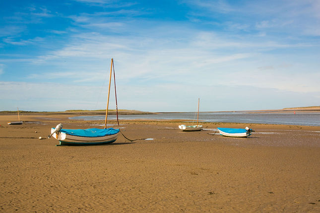 White boats on Appledore sandy beach North Devon