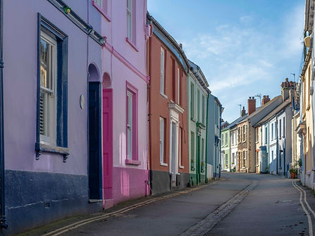a row of colorful cottages in Irsha street