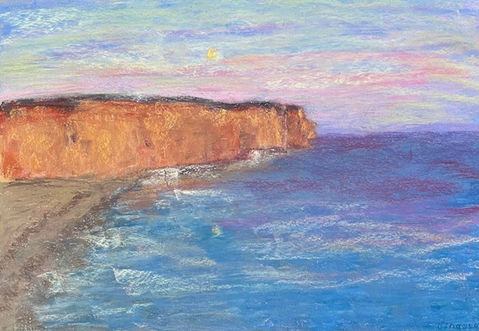Fading light English landscape with the mountains and the sea in soft pastel during sunset