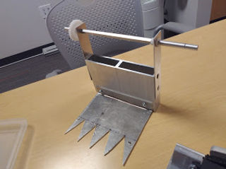 claw scooper.jpg