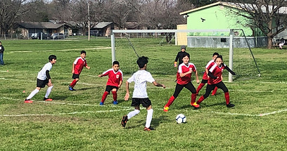 Youth soccer 7v7 coed in-house North Austin Soccer game in Austin, Texas