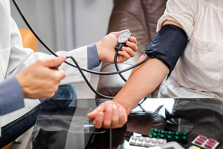 male-doctor-hands-measuring-tension-patient.jpg