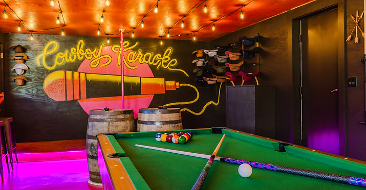 Karaoke stage amentiy concept and mural at Wild Wild Warehouse, Lacona, IA