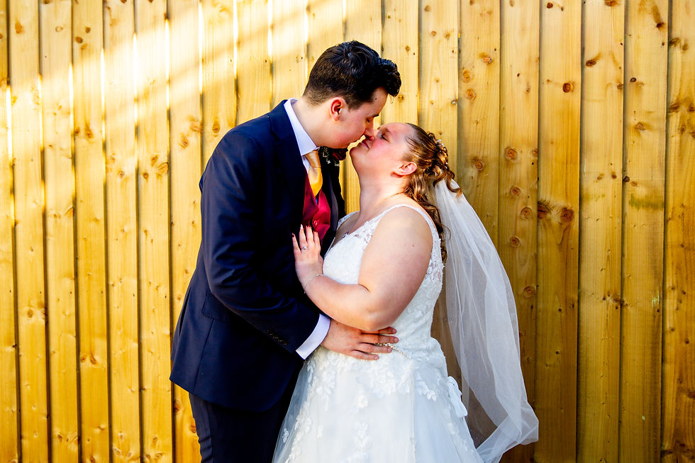 Bride and groom almost kissing