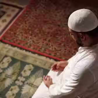 muslim-man-doing-namaz-high-angle-view_274679-48314.JPG