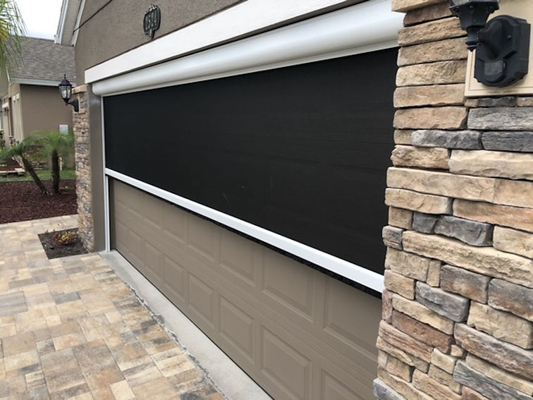 647e3d8854a58887423a399c_garage Door.jpeg