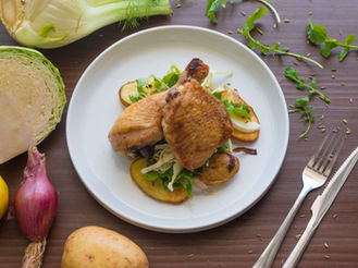 Pan-Roast Chicken Leg, Roast Potatoes and Onions, Cabbage and Rocket Salad