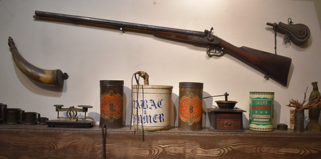 A gun on display, representing 'Chekhov's gun'