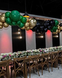 Gold, green and black floating balloon garland