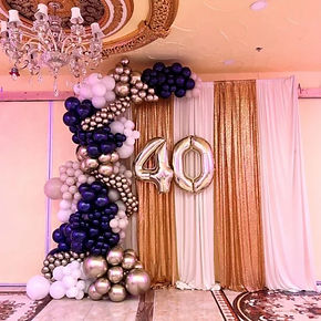 Navy, gold and white garland with a gold 40 balloon