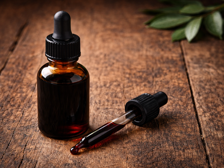 Blood tincture extracted in alcohol, a traditional preparation used to preserve botanical compounds.