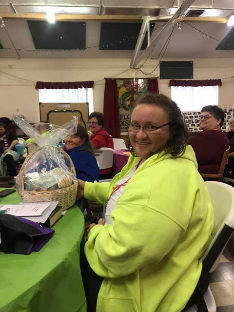 Womens Retreat - Wendy wins basket.jpg