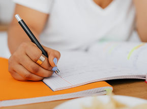 Student writing Letter of Continued Interest