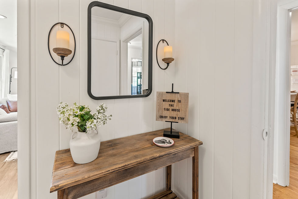 Clean, styled entryway in a vacation rental professionally cleaned and staged for guest arrival