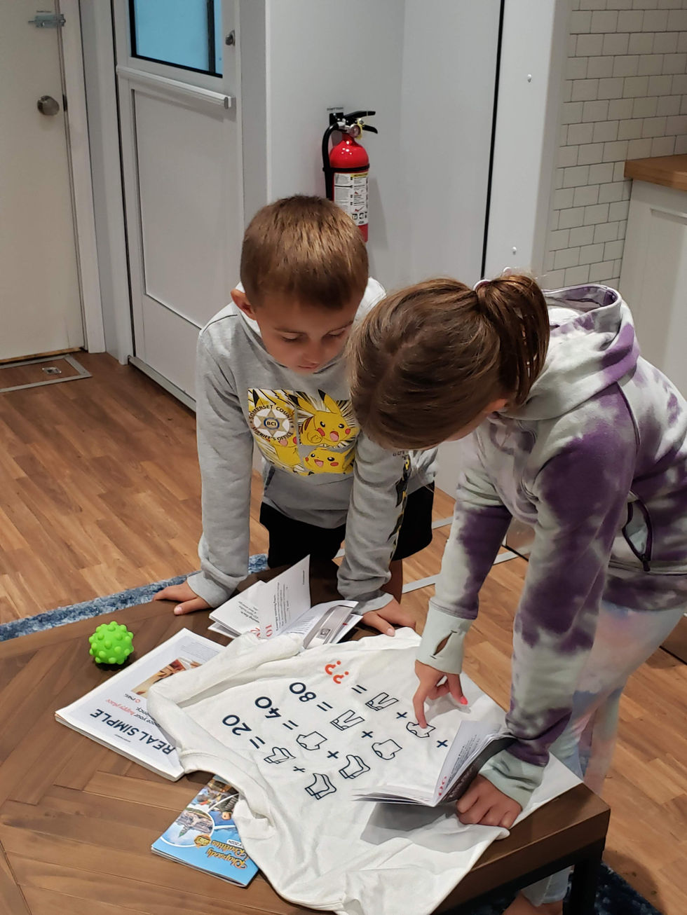 children take on a math puzzle