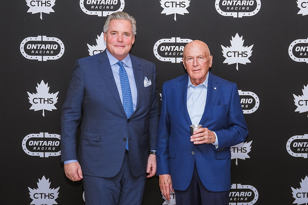 Photo 2 - Bob Krembil (right) recently received the Mint Julep Cup from CTHS president David Anderson