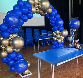 Scottish sports event balloon arch and face painting setup in Fife by Event Buddies Scotland