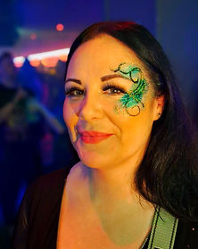 BAPIA accredited delicate face paint design matching outfit for daytime clubbing in Edinburgh venue by Event Buddies Scotland