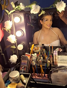 Event Buddies Scotland Hollywood Glam glitter bar setup with professional makeup mirrors, festival face gems, and a sequin backdrop wall

