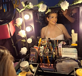 Event Buddies Scotland Hollywood Glam glitter bar setup with professional makeup mirrors, festival face gems, and a sequin backdrop wall