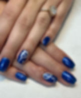 Medium coffin blue bandana manicure.