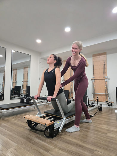 semi-private-pilates-class-instructor-melanie-balance.jpeg