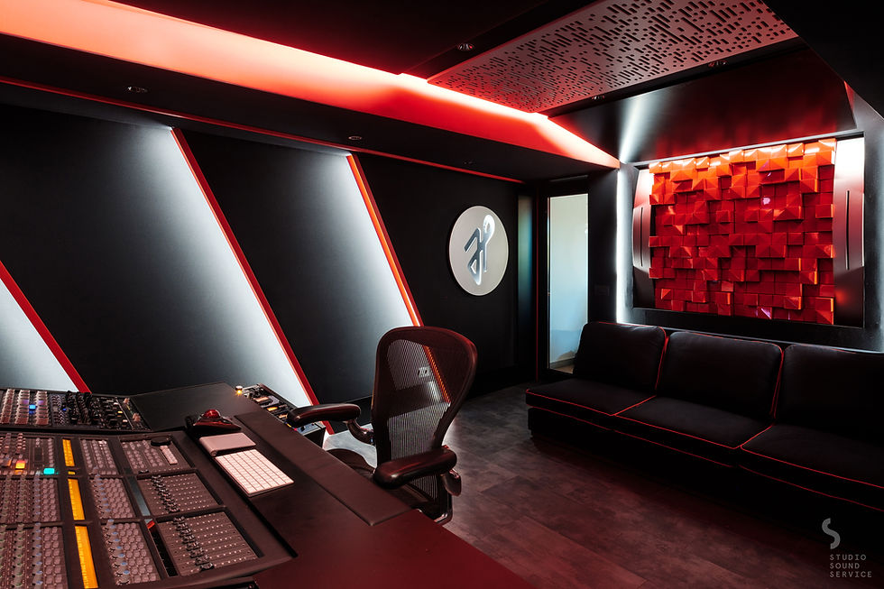 Studio room with red acoustic panels and mixing desk at Future Plan Sounds
