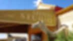 OLD SHOP FRONT AND CAMEL STATUE