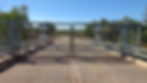 Bridge and locked gate over the Victoria River Military area
