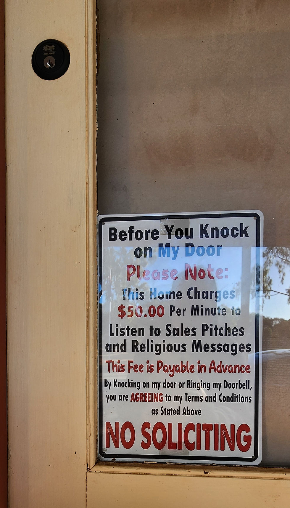 SIGN ON SHOP WINDOW