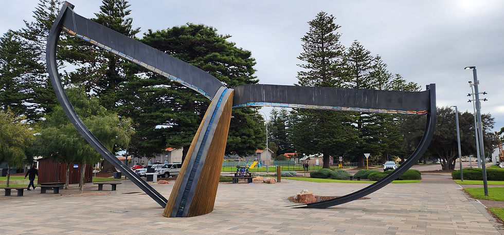 whale tail sculpture in park