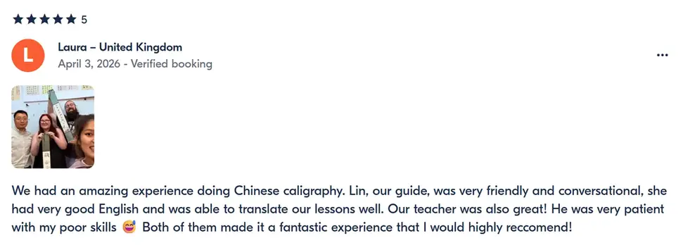 5-star GetYourGuide review from UK guest for BiteEscape Chinese calligraphy experience, highlighting friendly guide, patient teacher, and immersive cultural activity