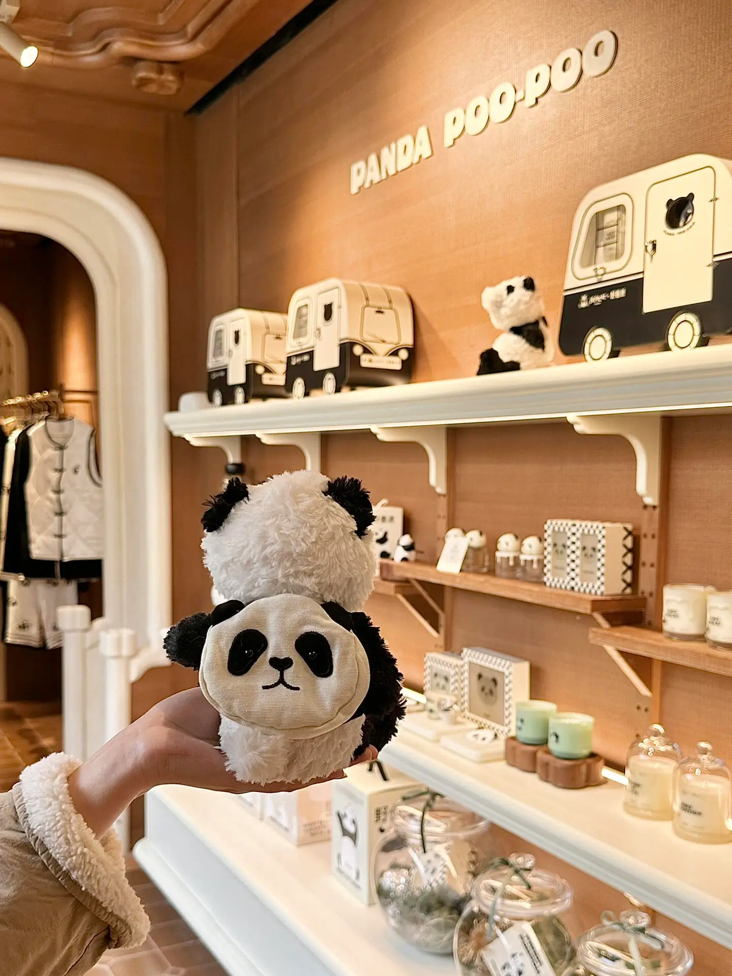 THE BEAST panda collction lifestyle products display in Shanghai store – clothing, candles, and home decor