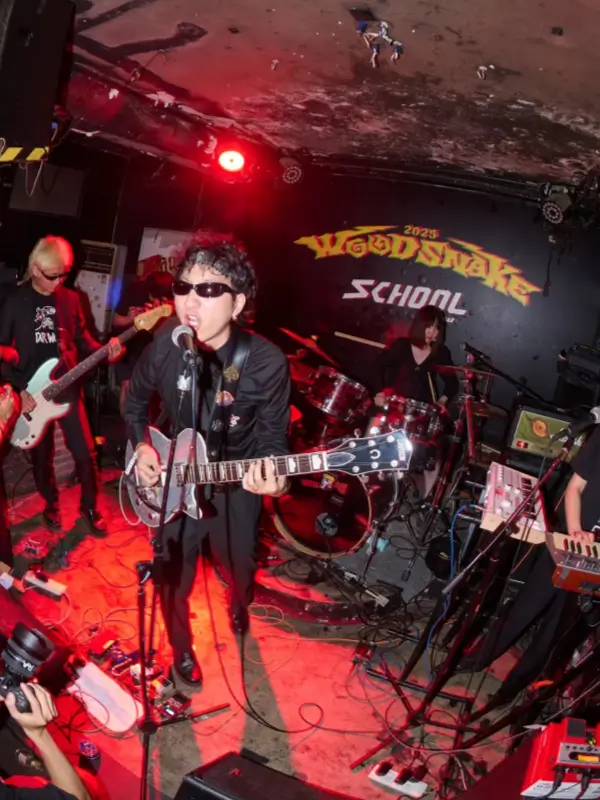 Live rock band performing at School Bar in Beijing