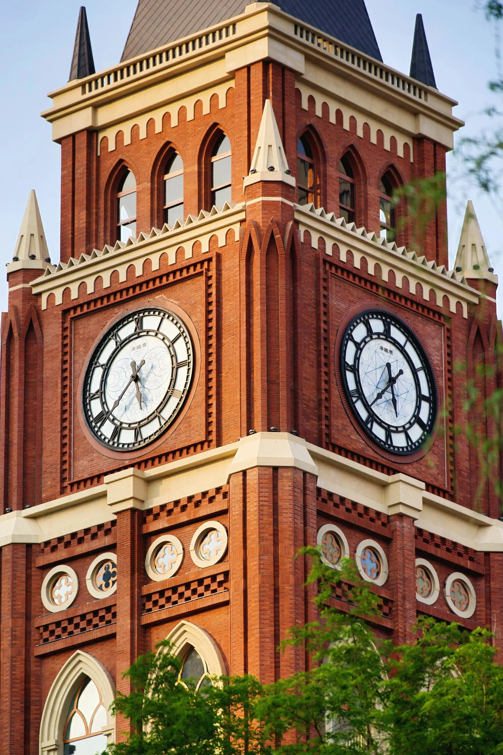 Historic European-style red brick building in Tianjin’s Five Great Avenues, featuring Gothic-inspired architecture and iconic clock towers