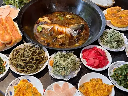 Local village-style dinner served after the Beijing countryside horseback riding experience.