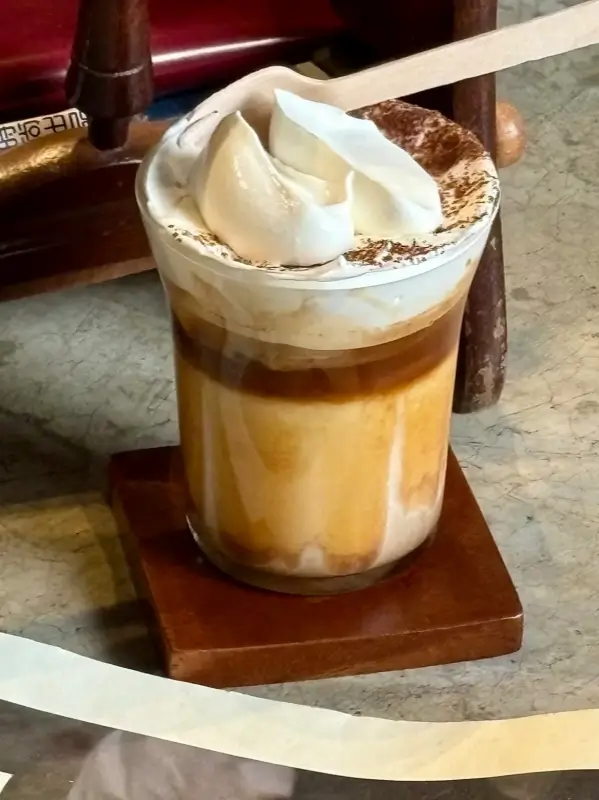 Viennese Coffee topped with thick cream at Metal Hands Café