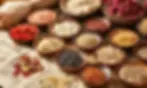 Traditional Chinese medicine herbs and natural ingredients displayed for a TCM cultural experience in Beijing.
