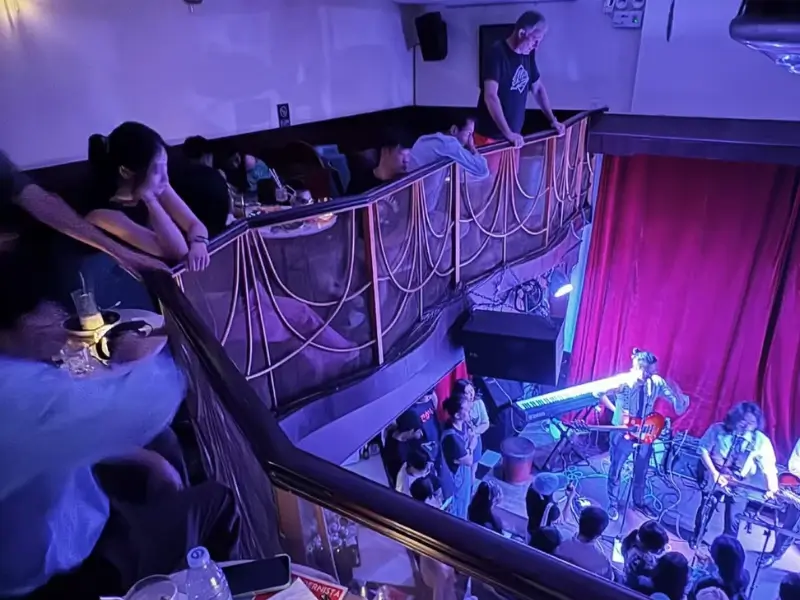 Live music performance inside Modernista bar in a Beijing hutong