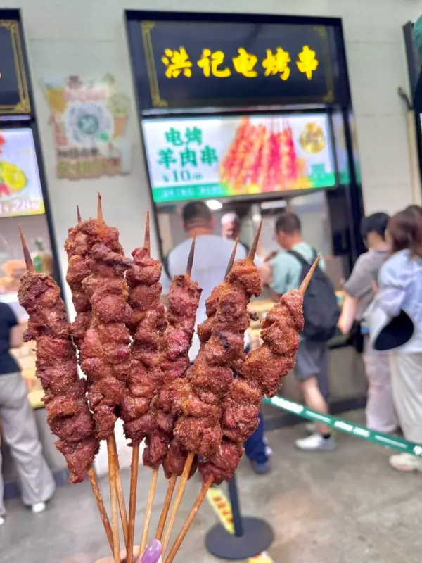 Grilled lamb skewers at Hongji on Niujie, a popular halal street-food spot in Beijing