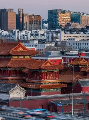 Bite Escape private tour Beijing skyline with traditional rooftops blending with modern cityscape