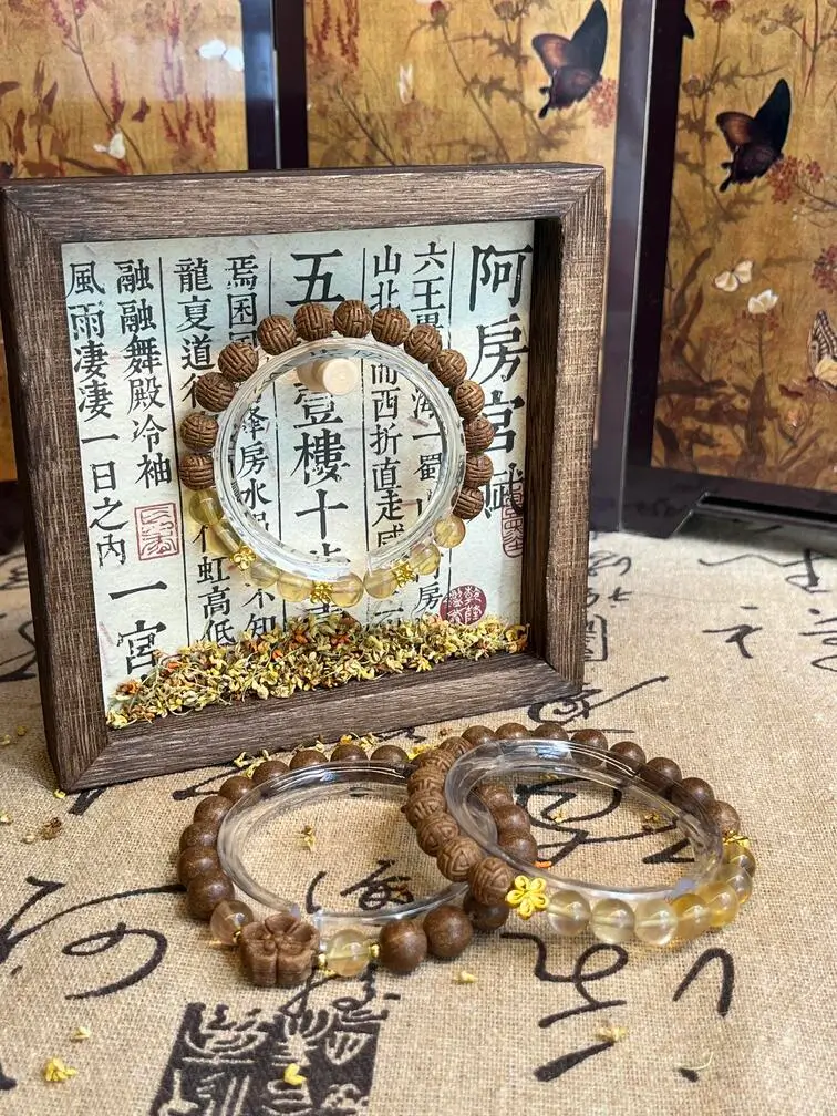 Tongrentang herbal bracelets displayed with traditional Chinese medicine herbs and calligraphy elements, reflecting Beijing’s TCM heritage.