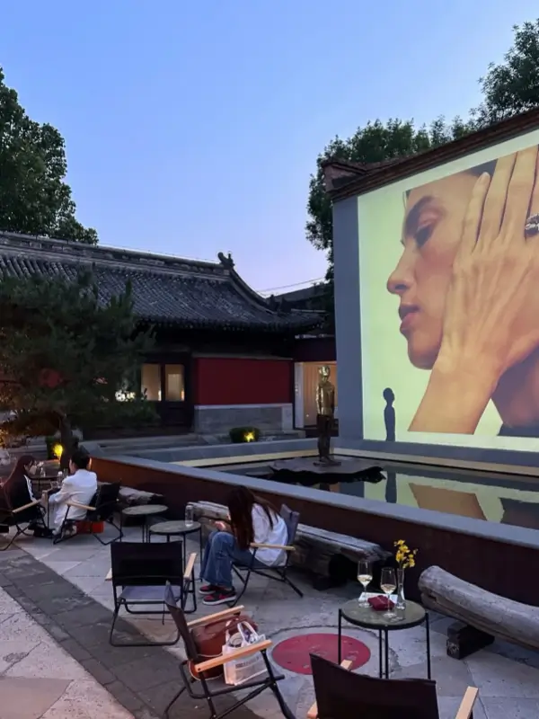 Evening projection event in the courtyard of Temple Dongjingyuan