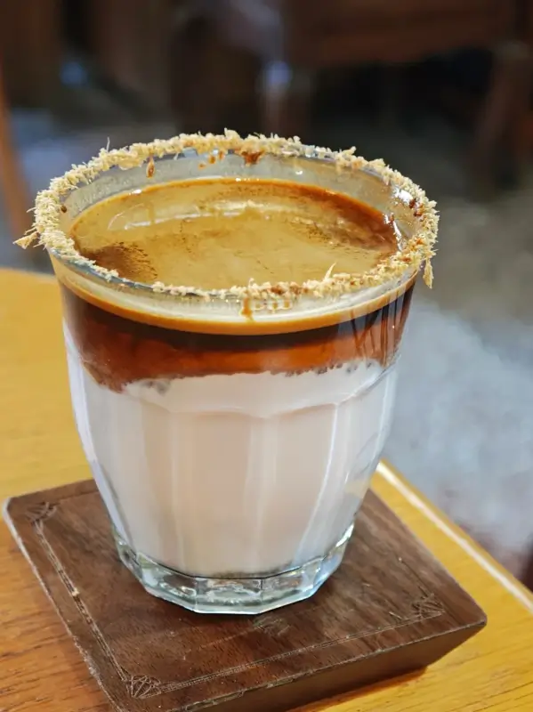 Guava Dirty coffee with a light pink fruit layer