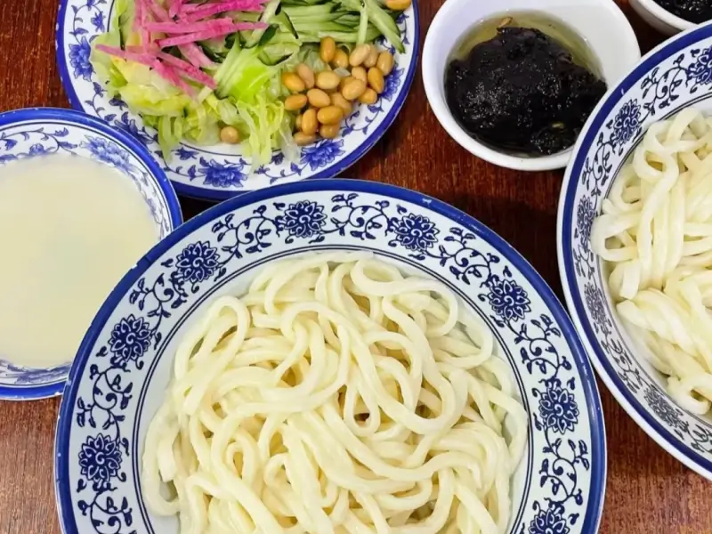 traditional noodle bowl and toppings at Fangzhuanchang zhajiangmian