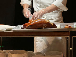 Beijing roast duck with crispy skin served at one of the top recommended restaurants in our Peking duck guide