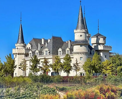 Changyu Chateau AFIP in Beijing, a European-style winery with castle-like towers, vineyards, wine cellar tours, and wine culture experiences.