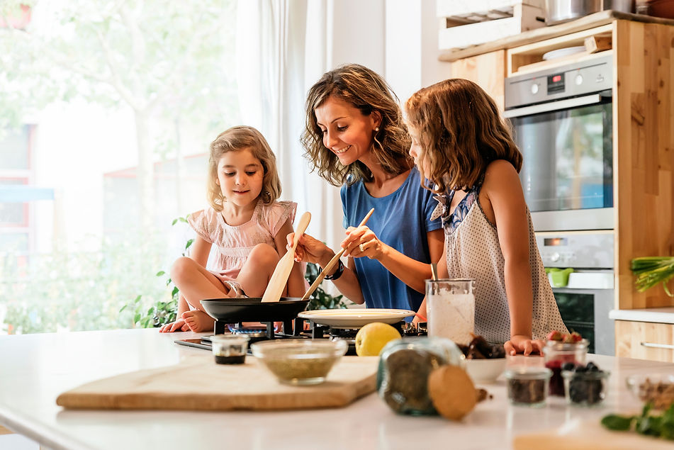 Mother and Daughters Cooking